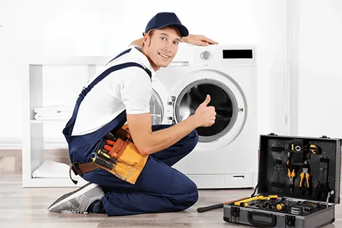 Best Choice Repair technician servicing a washing machine